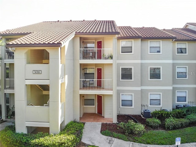 view of property with central AC unit