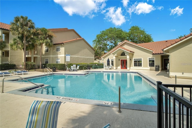 view of pool featuring a patio