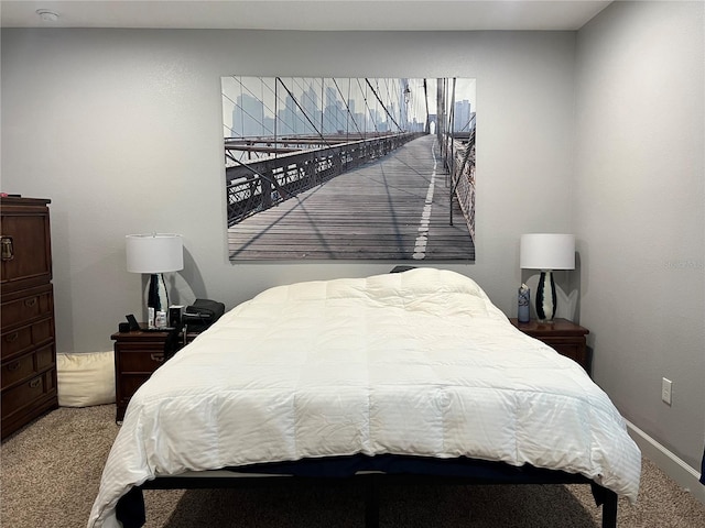 bedroom with light colored carpet