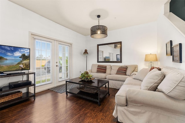 living room featuring french doors and dark hardwood / wood-style floors