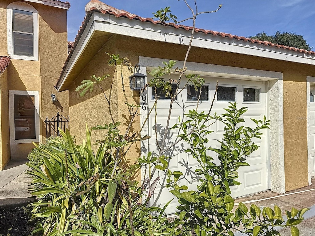 view of property exterior with a garage