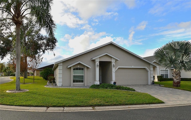 ranch-style house with a garage and a front lawn