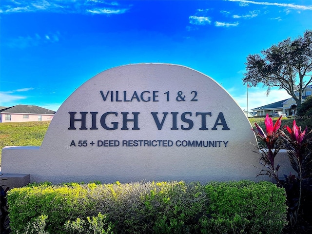 view of community sign