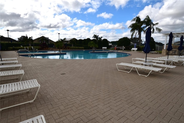 view of pool featuring a patio area