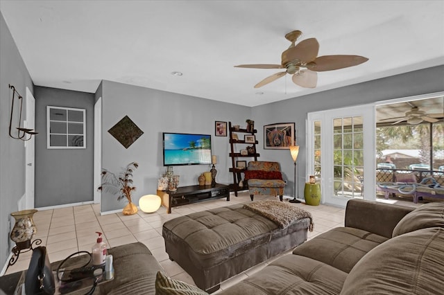 tiled living room featuring ceiling fan