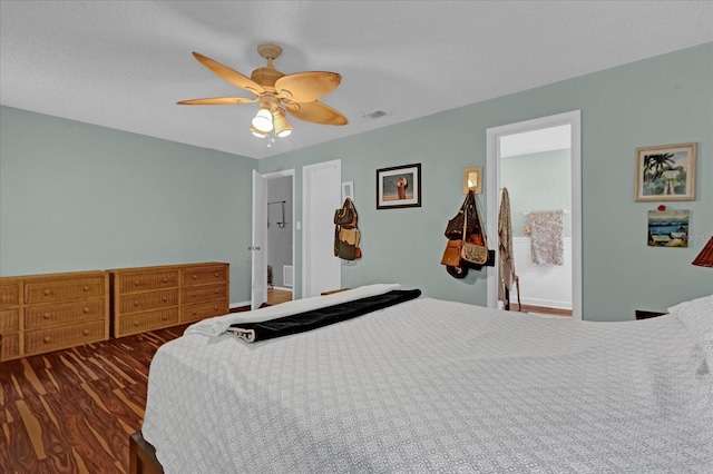 bedroom with ceiling fan and dark hardwood / wood-style floors