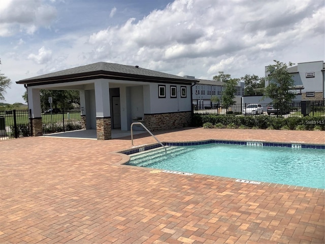 1800 Houston St, Kissimmee, FL 34743 - community pool featuring a patio area