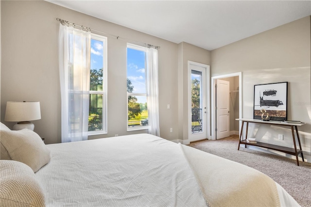 1800 Houston St, Kissimmee, FL 34743 - carpeted bedroom featuring access to exterior and baseboards