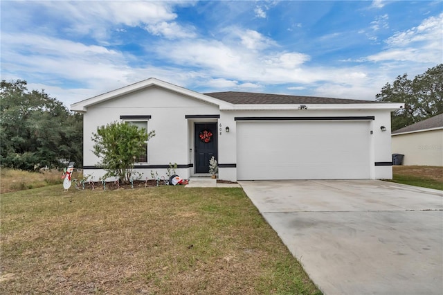 ranch-style home with a front lawn and a garage