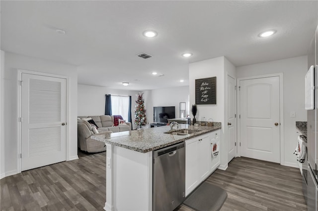 kitchen featuring dark hardwood / wood-style floors, sink, white cabinets, and dishwasher