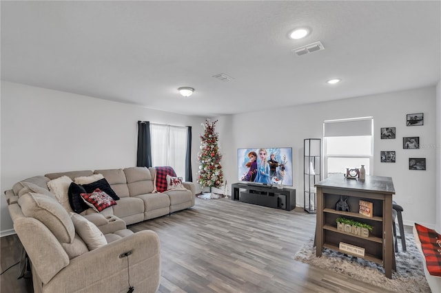 living room with light hardwood / wood-style floors