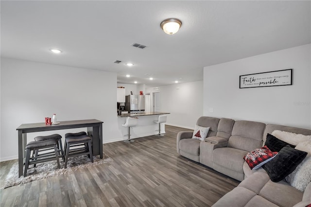 living room with dark wood-type flooring