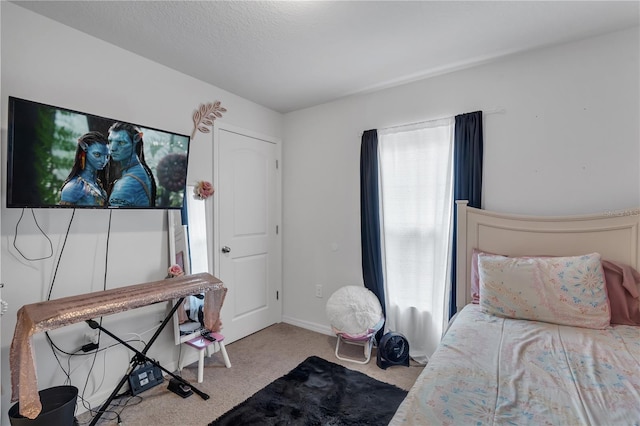 carpeted bedroom featuring multiple windows