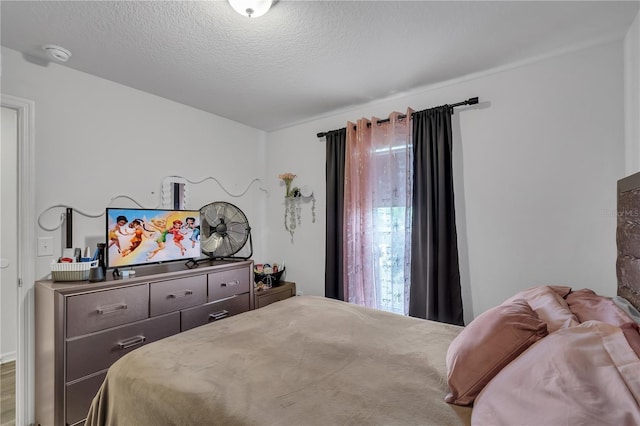 bedroom with a textured ceiling