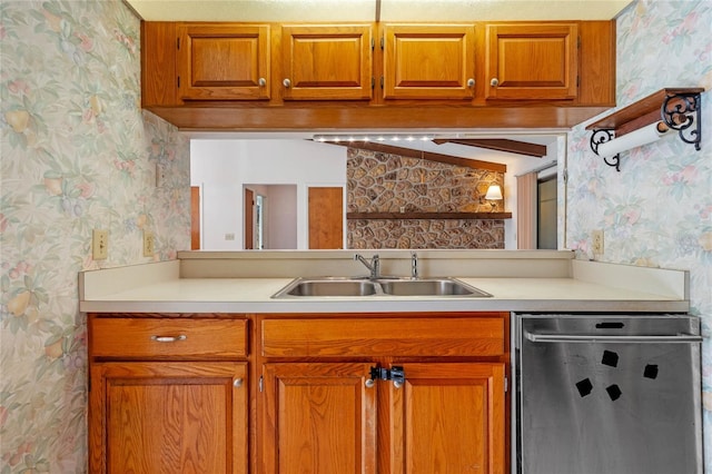 kitchen featuring stainless steel dishwasher and sink