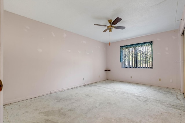 unfurnished room featuring ceiling fan