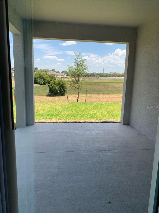 view of patio / terrace featuring a rural view