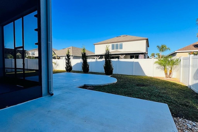 exterior space featuring a fenced backyard