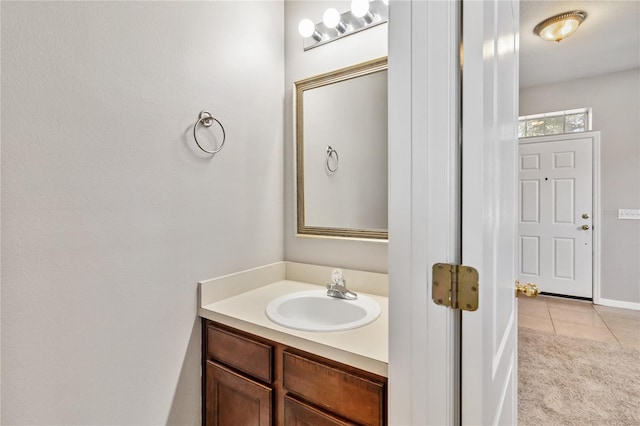 bathroom with vanity and tile patterned floors