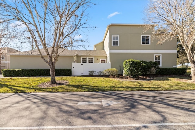 view of front of house with a front yard