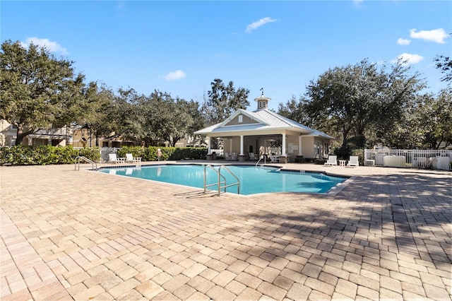 view of swimming pool featuring a patio