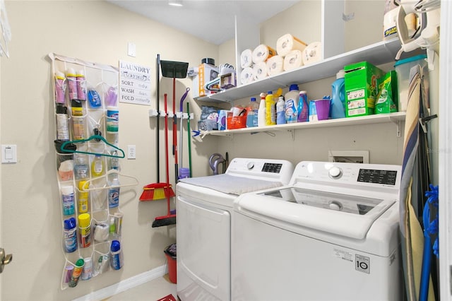 laundry room with washing machine and dryer