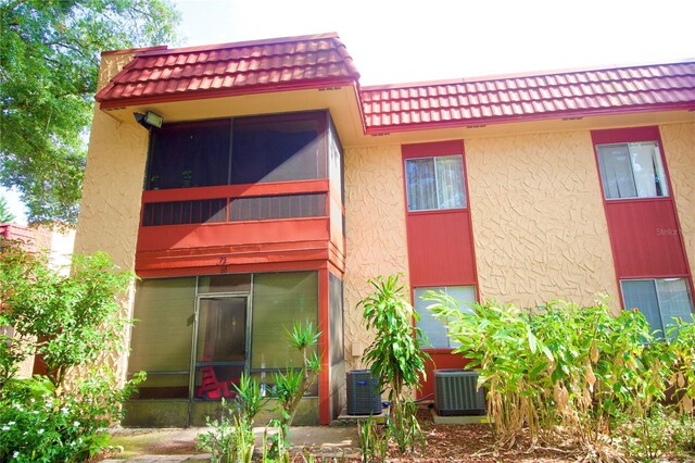 view of property with central air condition unit