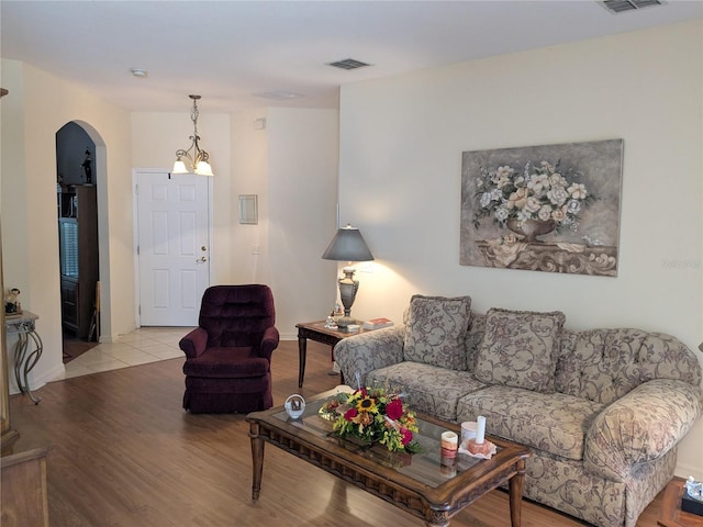 living room with light hardwood / wood-style flooring