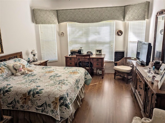 bedroom with wood-type flooring