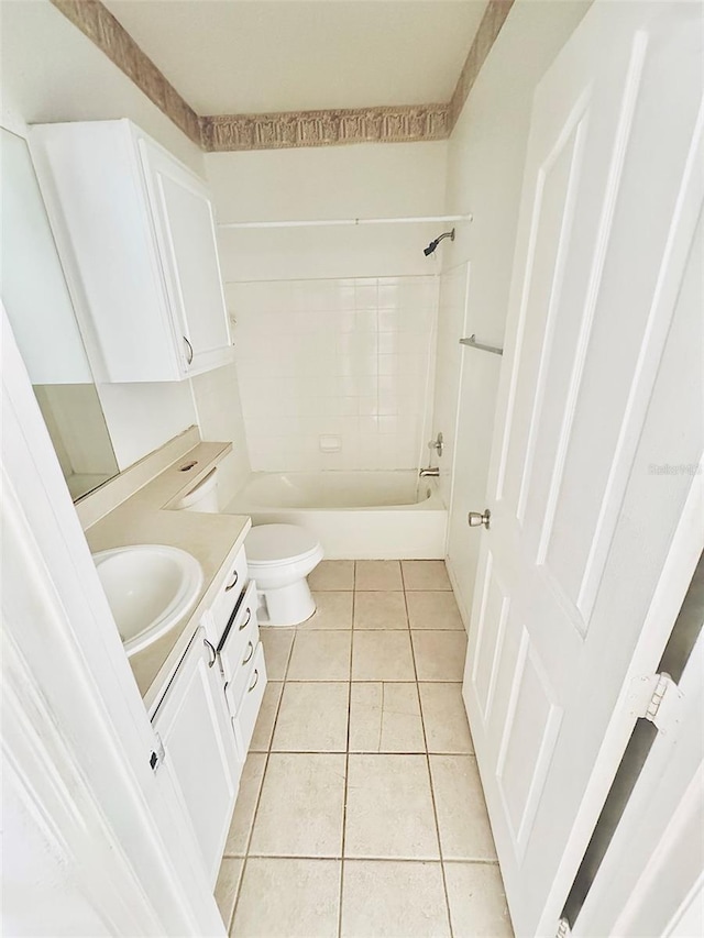 full bathroom with shower / washtub combination, tile patterned flooring, vanity, and toilet