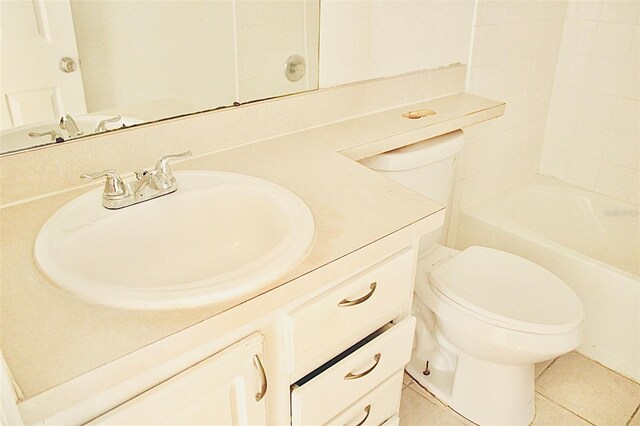 full bathroom with tile patterned flooring, vanity, toilet, and separate shower and tub