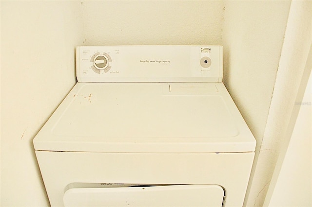 laundry room featuring washer / dryer