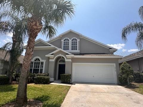 view of property featuring a front yard