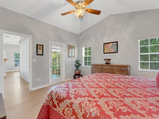 bedroom with ceiling fan, light wood-type flooring, access to outside, and vaulted ceiling