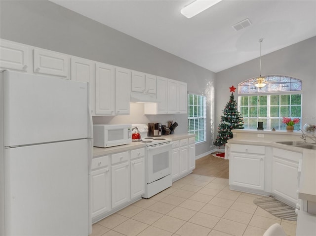 kitchen featuring white appliances, ceiling fan, sink, decorative light fixtures, and white cabinets