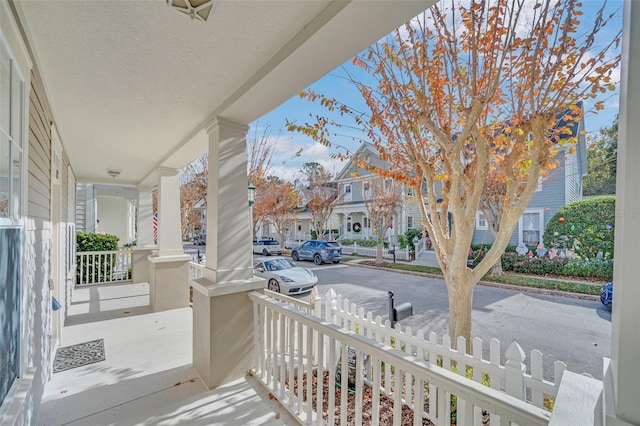 balcony featuring a porch