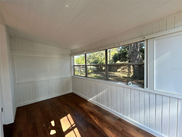 unfurnished sunroom with wood ceiling