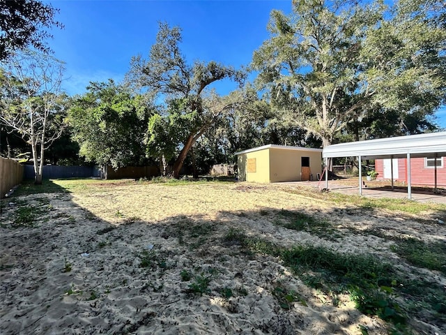 view of yard with a carport