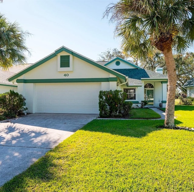 single story home featuring a front yard and a garage