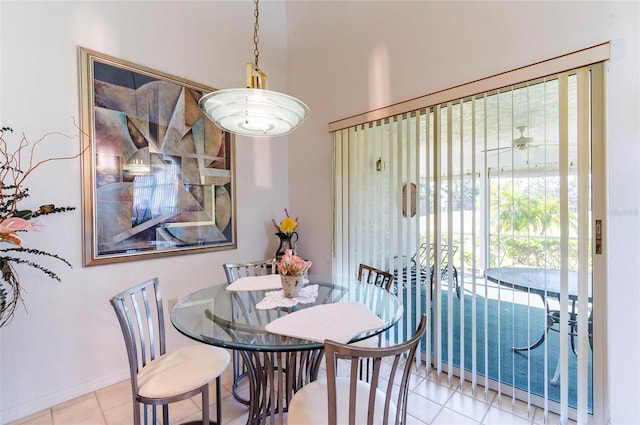 dining area with light tile patterned floors