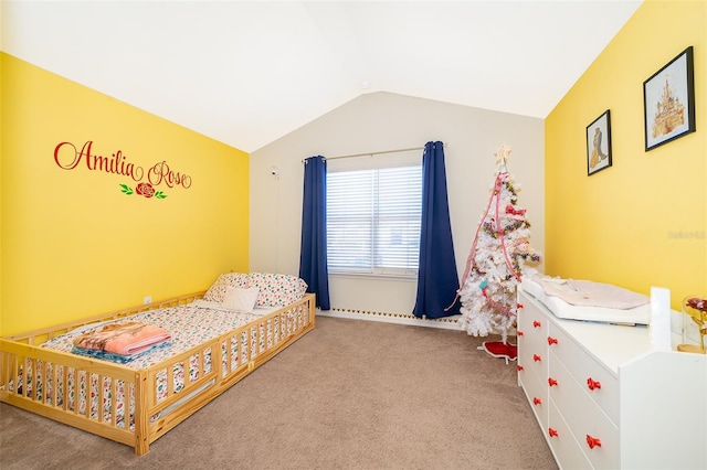 carpeted bedroom with vaulted ceiling