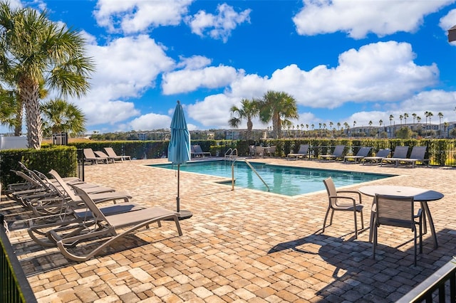 view of pool featuring a patio area