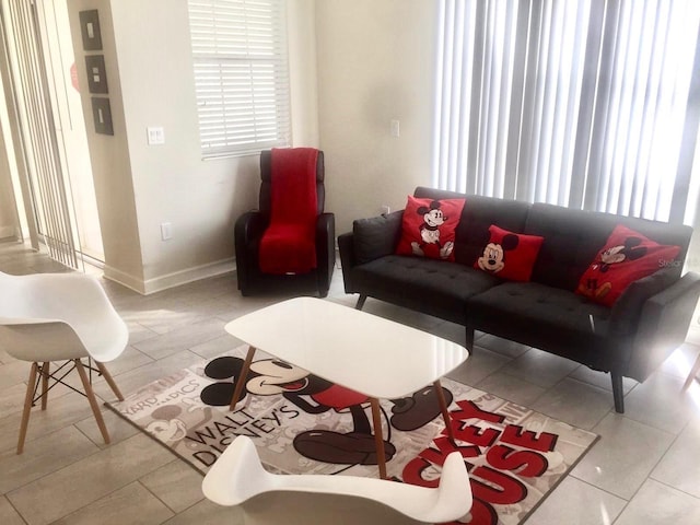 living room featuring light tile patterned floors