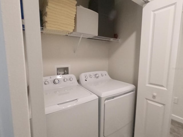 laundry area with washer and dryer