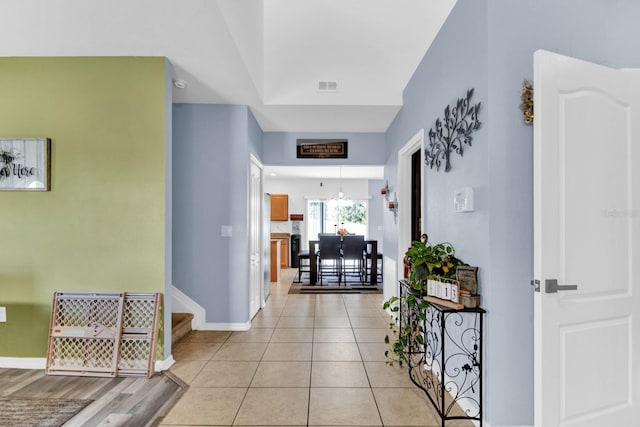 interior space with light tile patterned flooring