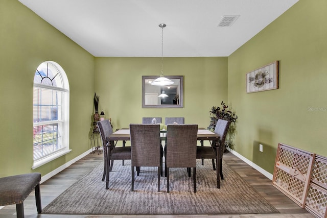 dining room featuring hardwood / wood-style flooring