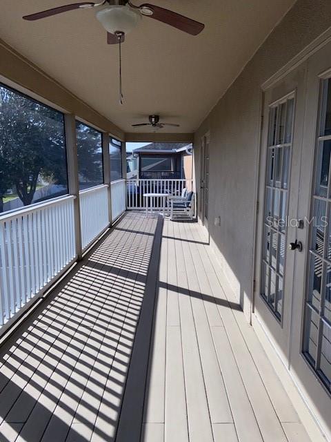 wooden deck featuring french doors