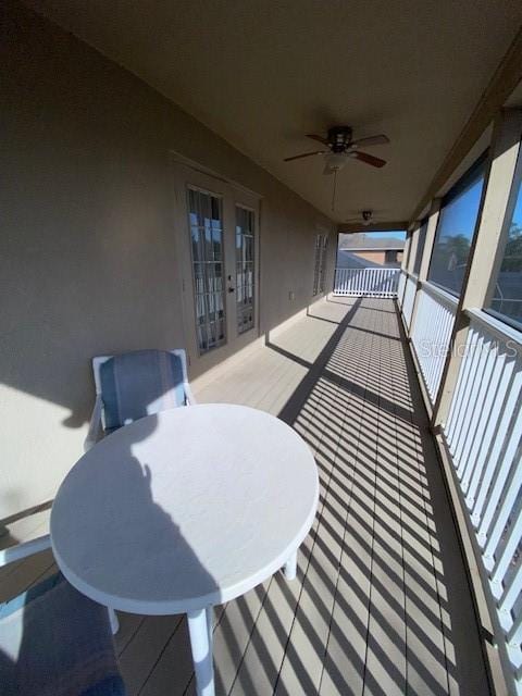 exterior space with french doors and ceiling fan