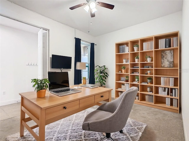 office area with ceiling fan