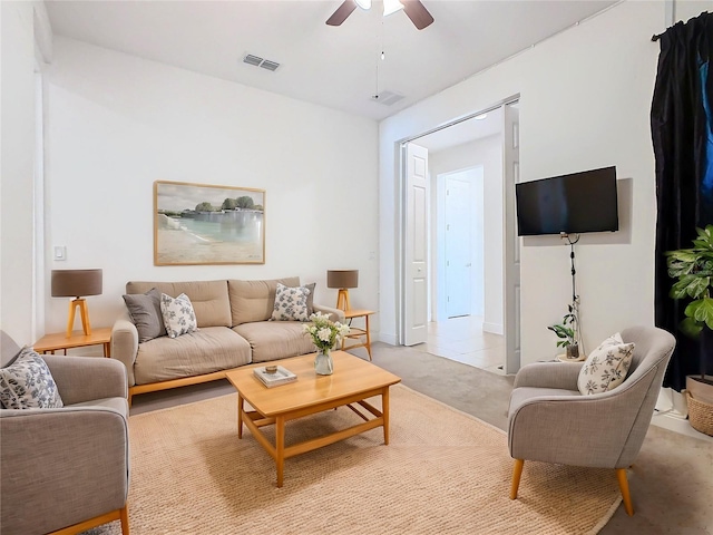 living room featuring ceiling fan